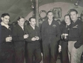 No 77 Squadron Association Korea photo gallery - Christmas 1952.  Aircrew Club, Kimpo. Ted Jones, Viv Shearn, Doc, Don Hillier, Vin Hill & Jim Crowther (Intello).  (B. Murphy)